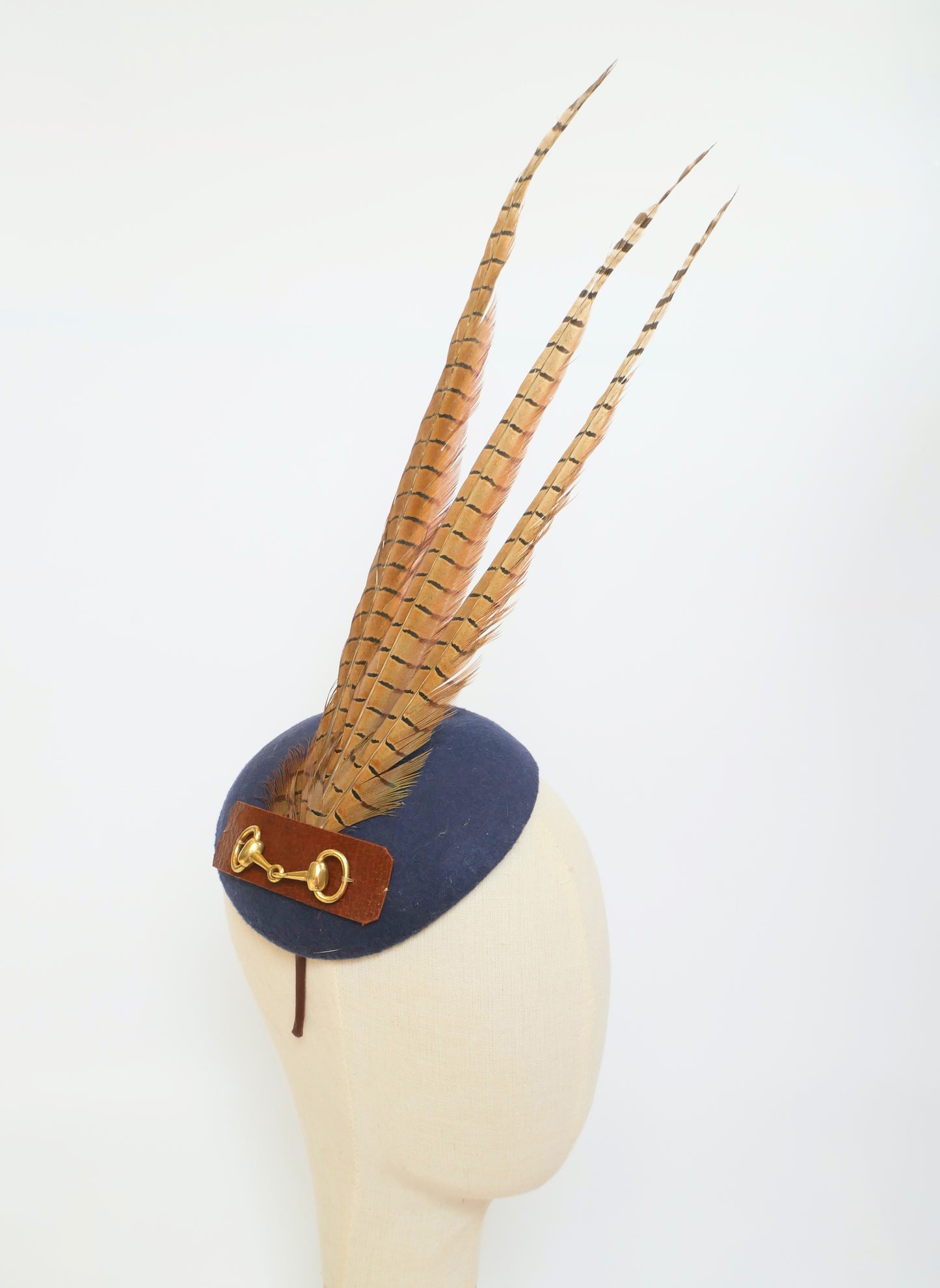 Feather and felt fascinator - navy snaffle